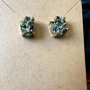 Beautiful post backed pyrite earrings in a gold setting for pierced ears